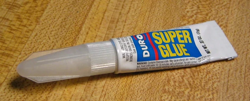 Why Does Super Glue Bond To Skin?